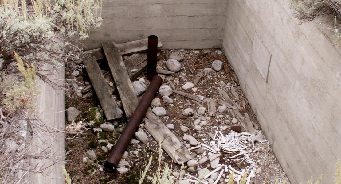 Abandoned well casing on site